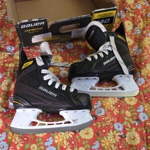 Bauer Black Youth Hockey Skates with White Blade Holders